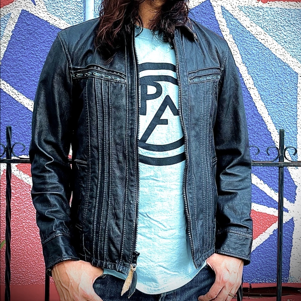 Vintage black leather Schott rocker jacket with teal threading / leather detail
